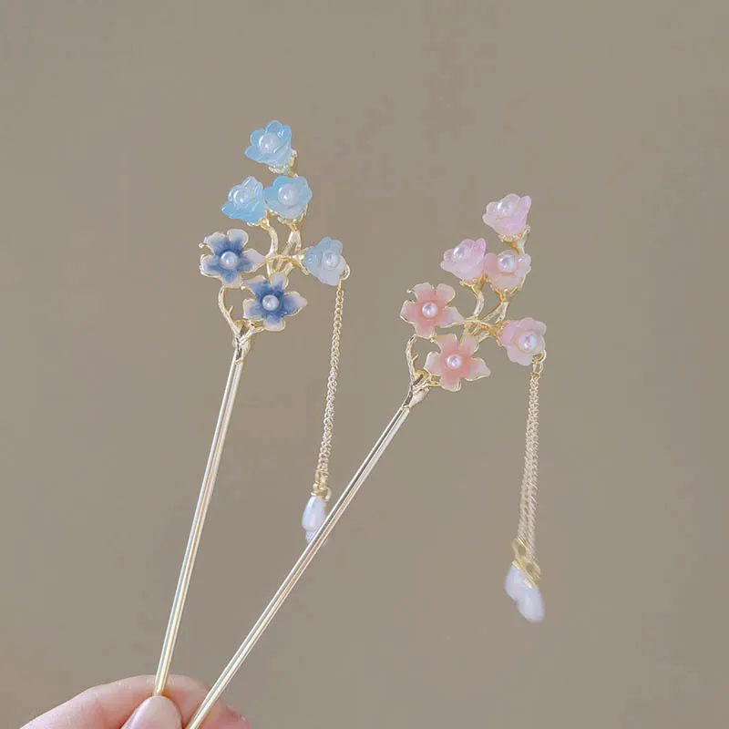 Головной убор в древнем стиле, заколка для волос с цветком лилии, кисточкой и высококачественная женская заколка для волос.
Головной убор в древнем стиле, заколка для волос с цветком лилии, кисточкой и высококачественная женская заколка для волос.