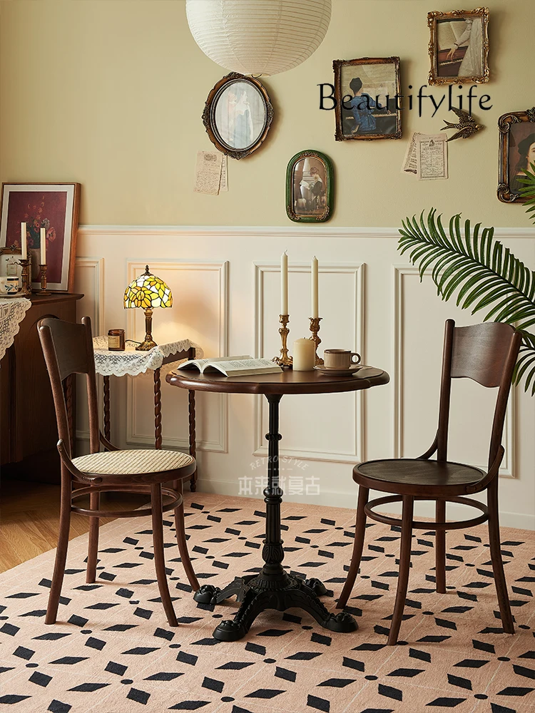 Retro solid wood dining chair simple French restaurant dining table and chair antique rattan chair
Retro solid wood dining chair simple French restaurant dining table and chair antique rattan chair