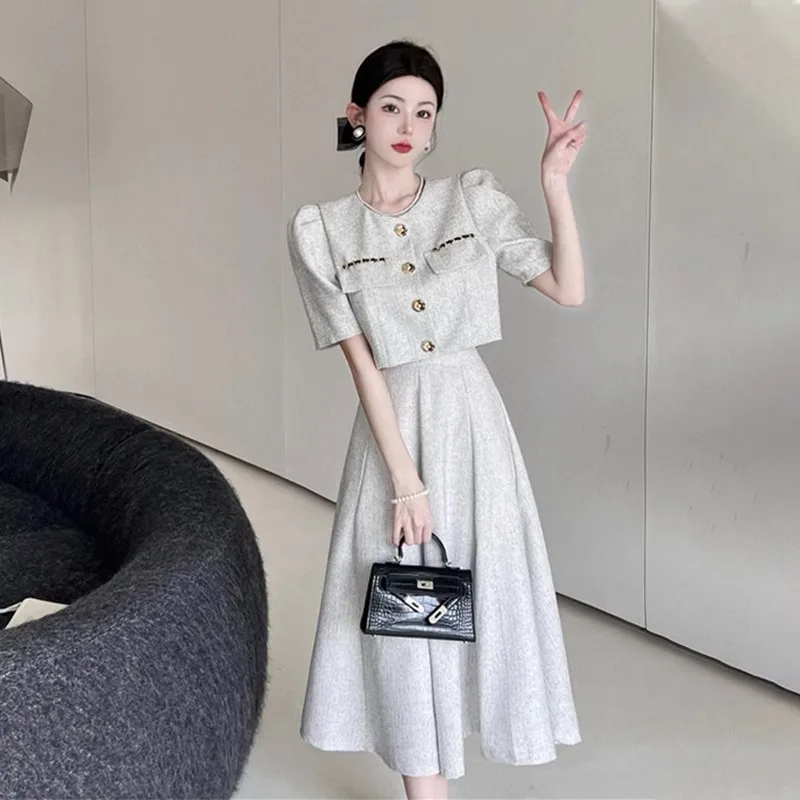 Women 2 Piece Set O-neck Long Sleeve Button Coat Top+elegant Splicing High Waist Zipper Long Skirts Holiday Suits
Women 2 Piece Set O-neck Long Sleeve Button Coat Top+elegant Splicing High Waist Zipper Long Skirts Holiday Suits