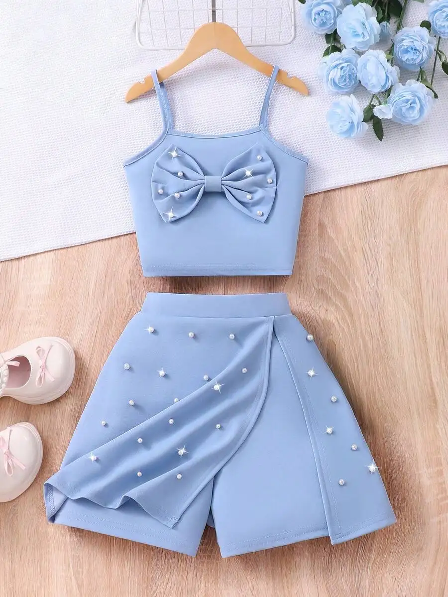 Pearl Embellished Bow Knot Camisole Top And Skort 2-Piece Set Sky Blue Summer Casual Outfit
Pearl Embellished Bow Knot Camisole Top And Skort 2-Piece Set Sky Blue Summer Casual Outfit