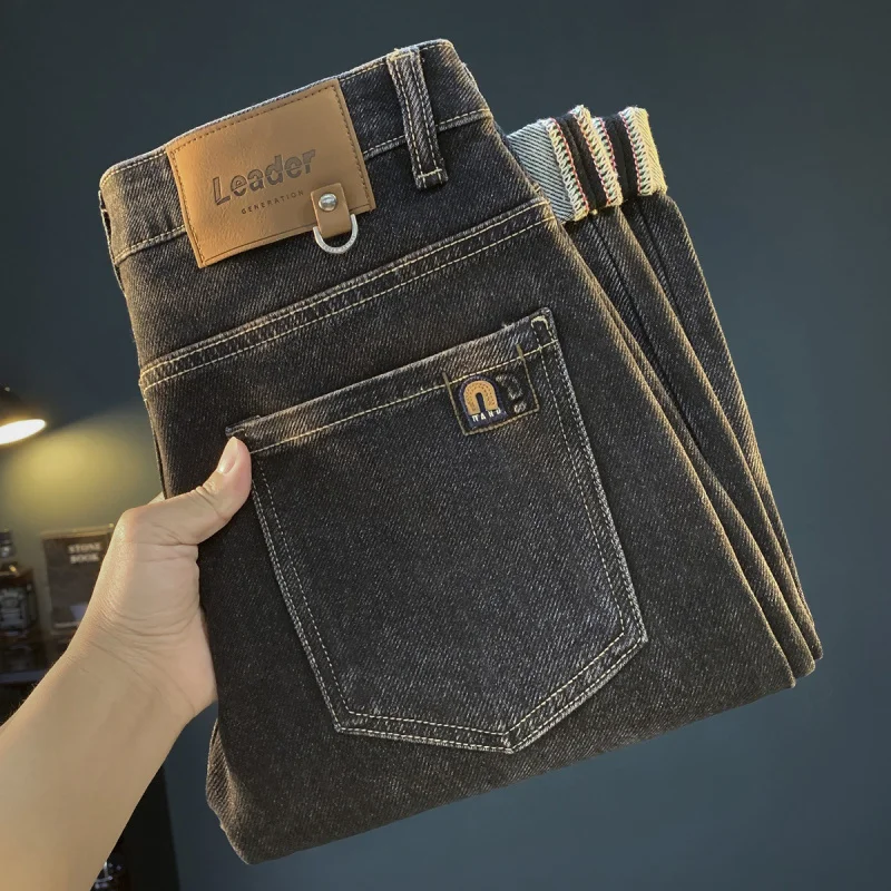 Черные джинсы, мужские осенне-зимние новинки 2025 года, эластичные модные брюки на маленьких штанинах, легкая одежда luxu, высокая одежда
Черные джинсы, мужские осенне-зимние новинки 2025 года, эластичные модные брюки на маленьких штанинах, легкая одежда luxu, высокая одежда