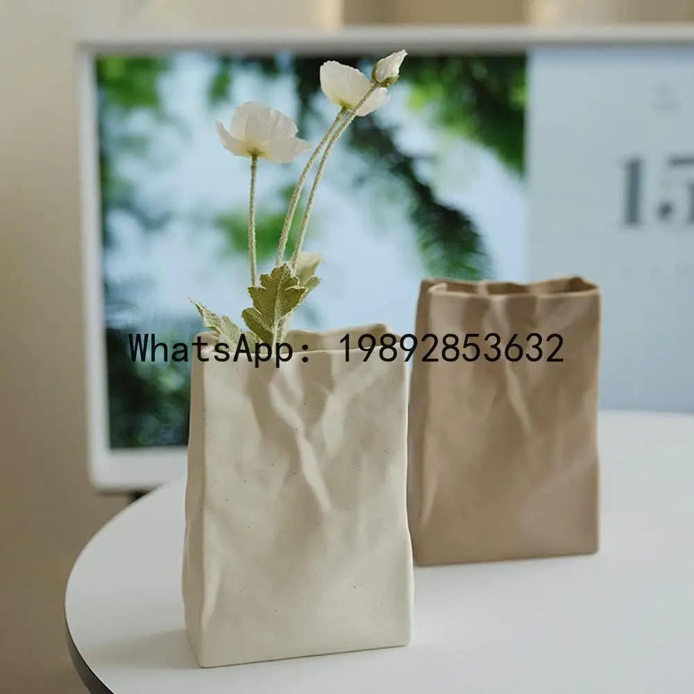 HP ceramic creative paper bag, Nordic ceramic white vase ins wind creative flower arrangement simple ornament
HP ceramic creative paper bag, Nordic ceramic white vase ins wind creative flower arrangement simple ornament