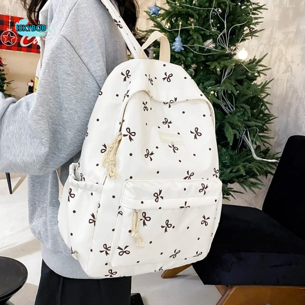 Nylon Material Bow Print Backpack Adjustable Straps Multi-Pocket Large Capacity School Bag Reinforce Structure Quilted Design
Nylon Material Bow Print Backpack Adjustable Straps Multi-Pocket Large Capacity School Bag Reinforce Structure Quilted Design