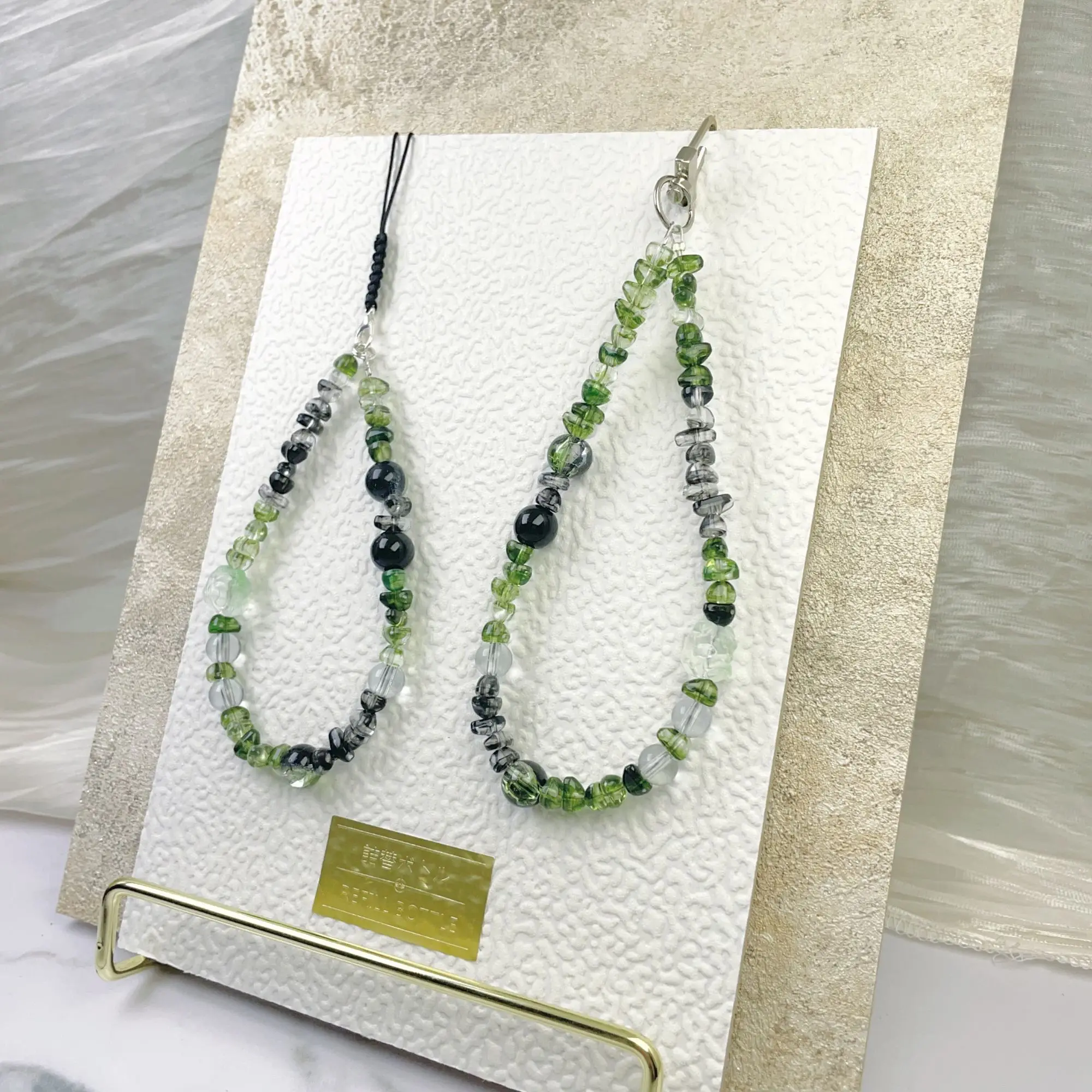 Подвеска для телефона с зелеными кристаллами ручной работы, ремешок на запястье с бисером, эстетический милый ремешок для телефона Ins, чехол для телефона, брелок для камеры CCD
Подвеска для телефона с зелеными кристаллами ручной работы, ремешок на запястье с бисером, эстетический милый ремешок для телефона Ins, чехол для телефона, брелок для камеры CCD