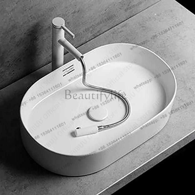 White Ceramic Above Counter Sink Modern Simple Oval Bathroom Sink Washroom and Balcony Artistic Wash Basin for Home Office Use
White Ceramic Above Counter Sink Modern Simple Oval Bathroom Sink Washroom and Balcony Artistic Wash Basin for Home Office Use