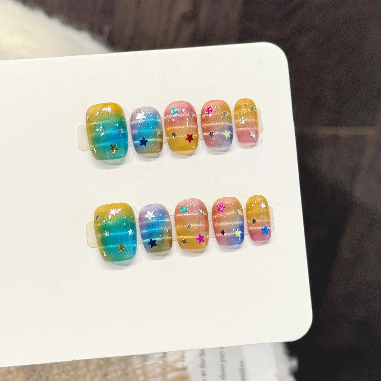 10pcs Rainbow Gradient Handmade Nails Star Glitter Press on Nail Short Square False Nail for Women&Girl Removable Wearable Nail
10pcs Rainbow Gradient Handmade Nails Star Glitter Press on Nail Short Square False Nail for Women&Girl Removable Wearable Nail
