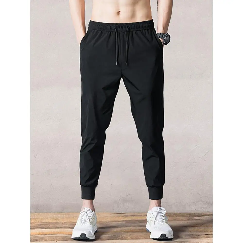 Мужские спортивные брюки Slim Fit из ледяного шелка, осенне-весенние легкие повседневные брюки с девятью точками, летняя мода для мальчиков Qui Dry
Мужские спортивные брюки Slim Fit из ледяного шелка, осенне-весенние легкие повседневные брюки с девятью точками, летняя мода для мальчиков Qui Dry