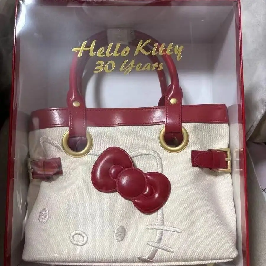 Sanrio Hello Kitty Cartoon Women's Canvas Bag Simple Design Large Capacity New Tote Bag Korean Version Sweet Girl Casual Handbag
Sanrio Hello Kitty Cartoon Women's Canvas Bag Simple Design Large Capacity New Tote Bag Korean Version Sweet Girl Casual Handbag