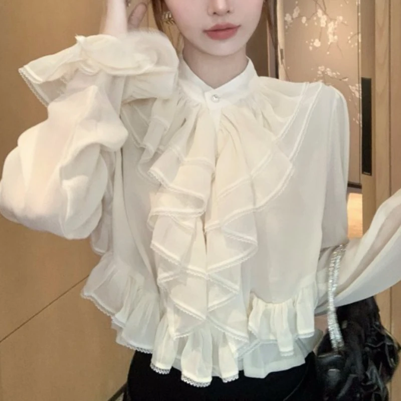 French Style Stand Collar Pleated Tops Short style White Ruffle Shirt 2025 Spring Solid Color Flare Sleeve Women Blouse
French Style Stand Collar Pleated Tops Short style White Ruffle Shirt 2025 Spring Solid Color Flare Sleeve Women Blouse