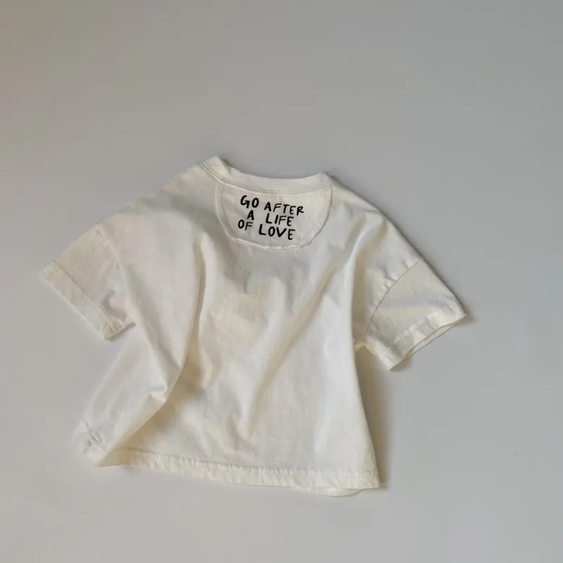 Girls brief cotton loose Tops 2025 New Summer Children's T-shirt back letters patch Boys short sleeve Tees
Girls brief cotton loose Tops 2025 New Summer Children's T-shirt back letters patch Boys short sleeve Tees