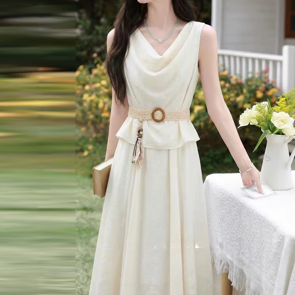 French temperament white vest dress women's summer new thin holiday style design fake two long skirts
French temperament white vest dress women's summer new thin holiday style design fake two long skirts