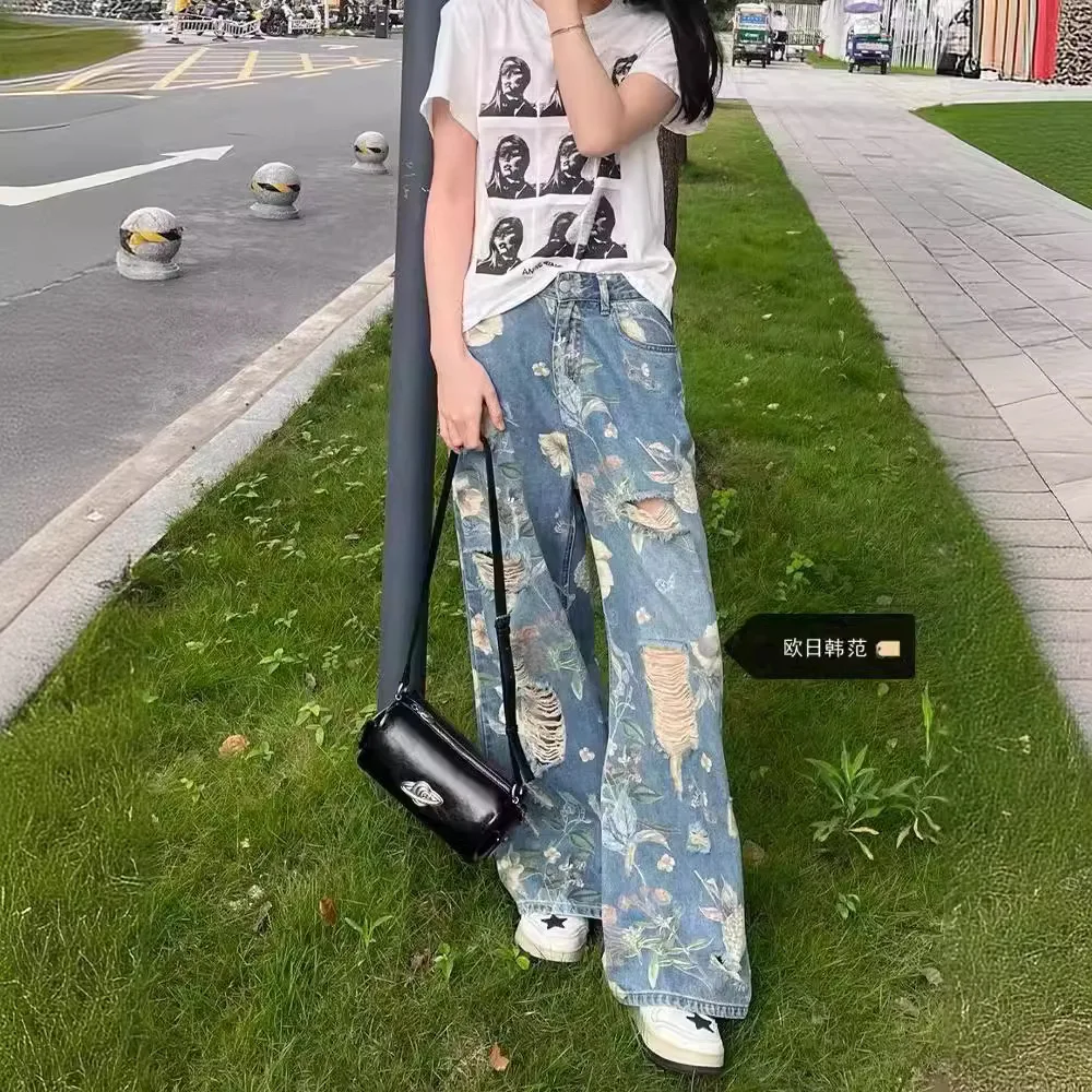 Рваные джинсы в американском стиле ретро с цветочным принтом граффити, свободные прямые широкие брюки с высокой талией, 2021, осень и зима N 
Рваные джинсы в американском стиле ретро с цветочным принтом граффити, свободные прямые широкие брюки с высокой талией, 2021, осень и зима N