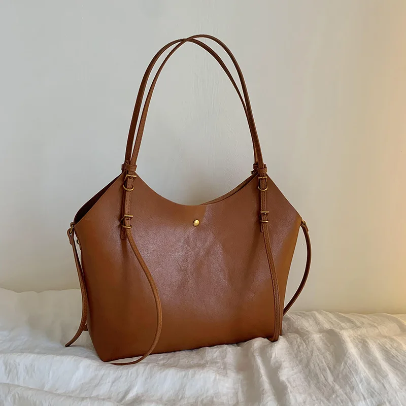 Женская сумка-тоут большой вместимости весны 2020, модная женская сумка через плечо в минималистском стиле для поездок на работу
Женская сумка-тоут большой вместимости весны 2020, модная женская сумка через плечо в минималистском стиле для поездок на работу