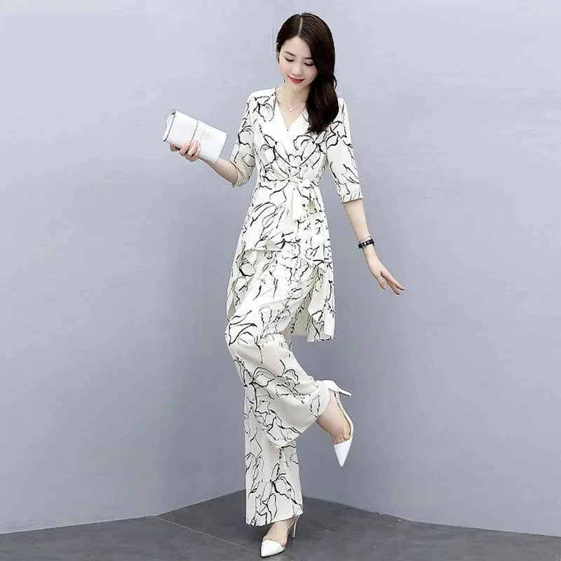 Women Summer Set Fashion Female Chiffon Wide Leg Pants Two-Piece Suit New Temperament Printed Lady Suit Loose Outfit 4XL
Women Summer Set Fashion Female Chiffon Wide Leg Pants Two-Piece Suit New Temperament Printed Lady Suit Loose Outfit 4XL