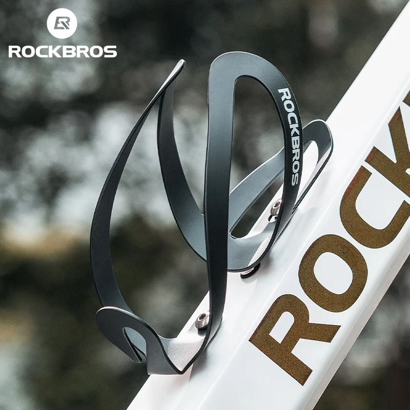 ROCKBROS Bottle Holder Aluminium Alloy Water Bottle Cage Adjustable Lightweight Mountain Cycling Bottle Cup Bracket Accessory
ROCKBROS Bottle Holder Aluminium Alloy Water Bottle Cage Adjustable Lightweight Mountain Cycling Bottle Cup Bracket Accessory