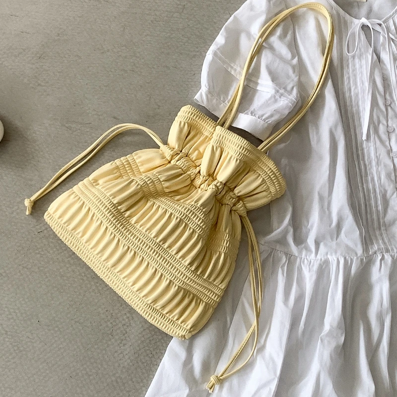 Summer New Style Drawstring Pleated Single Shoulder Bag Designer Soft PU Leather Fashionable Versatile Korean Bucket Bag 2026
Summer New Style Drawstring Pleated Single Shoulder Bag Designer Soft PU Leather Fashionable Versatile Korean Bucket Bag 2026
