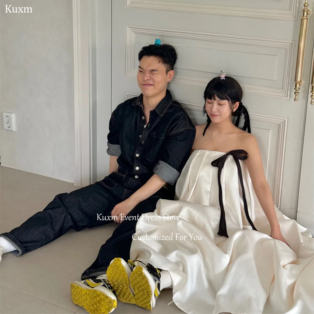Kuxm Strapless A Line Korea Wedding Dress Sleeveless Satin Bridal Gown Ribbon Photo Shoot Floor Length Robe De Mariée Customized
Kuxm Strapless A Line Korea Wedding Dress Sleeveless Satin Bridal Gown Ribbon Photo Shoot Floor Length Robe De Mariée Customized