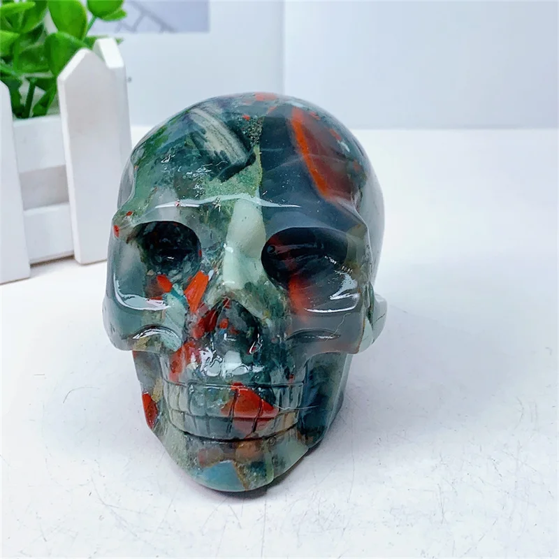 Natural Blood Stone Agate Skull Carving Sculpture, Healing Gemstone, Crystal Crafts, Home Decoration Ornament, 1Pc, 0.755kg
Natural Blood Stone Agate Skull Carving Sculpture, Healing Gemstone, Crystal Crafts, Home Decoration Ornament, 1Pc, 0.755kg