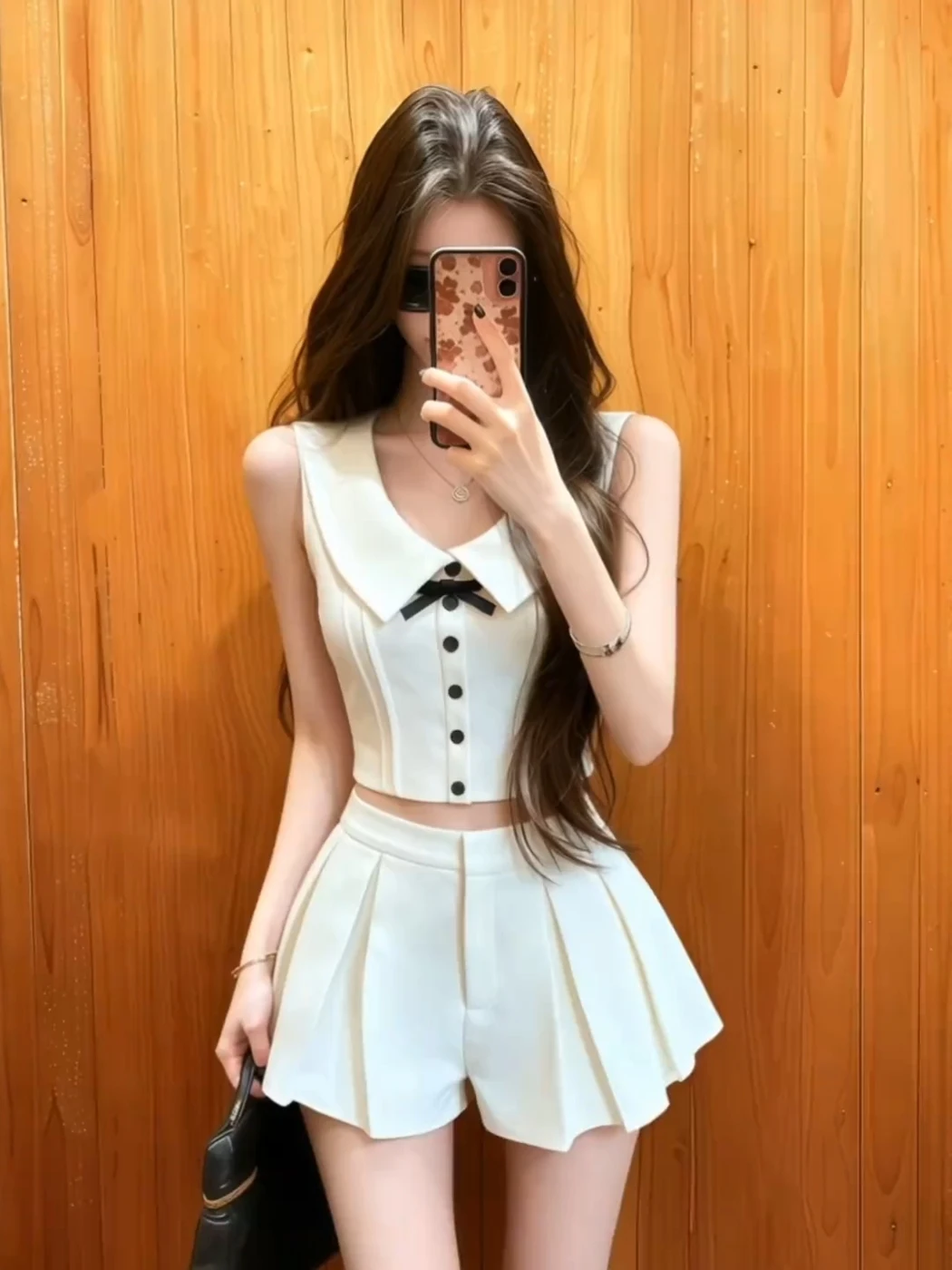 Summer Fashion Set for Women High Waist Midi Skirt And Sleeveless Collared Vest with Knot Two Piece Ensemble
Summer Fashion Set for Women High Waist Midi Skirt And Sleeveless Collared Vest with Knot Two Piece Ensemble