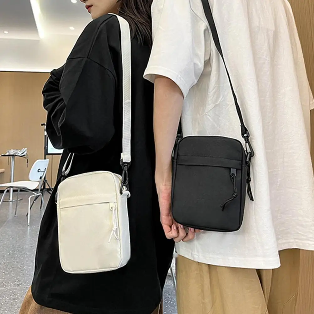 Unisex Crossbody Bag Oxford Cloth Shoulder Bag Solid Color Phone Bag Crossbody Purse for Everyday Outings Street Shopping
Unisex Crossbody Bag Oxford Cloth Shoulder Bag Solid Color Phone Bag Crossbody Purse for Everyday Outings Street Shopping