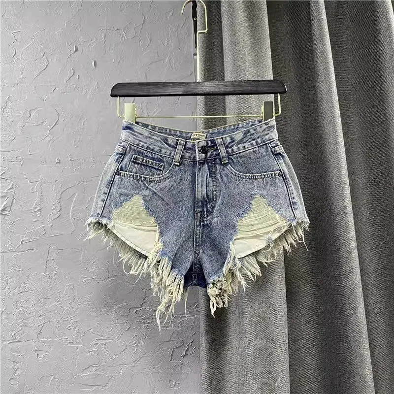 Fashion Low-Rise Shorts Women's Fringed Pants, 2025 New Summer Wear White Jeans Ripped A-line Hot Pants Trend Calças Femininas
Fashion Low-Rise Shorts Women's Fringed Pants, 2025 New Summer Wear White Jeans Ripped A-line Hot Pants Trend Calças Femininas