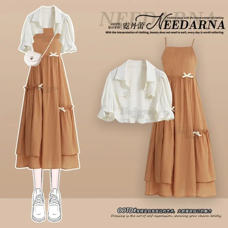 Summer Dress Set Women’s 2025 New Short-sleeved Shirt with French Suspender Dress Two-piece Set
Summer Dress Set Women’s 2025 New Short-sleeved Shirt with French Suspender Dress Two-piece Set