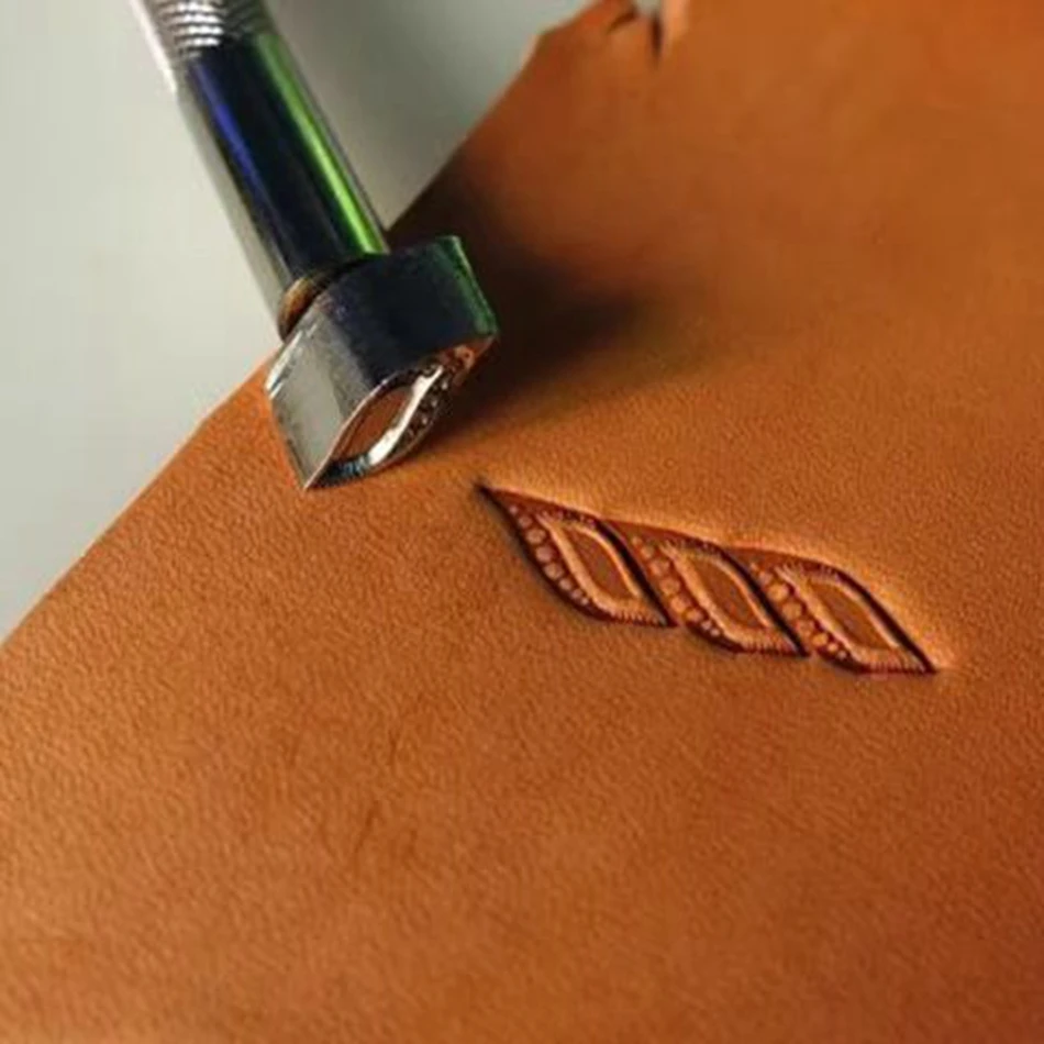 Leatherworking tools and hardware, precision steel engraving and embossing tools, cordage stamping patterns, left.
Leatherworking tools and hardware, precision steel engraving and embossing tools, cordage stamping patterns, left.