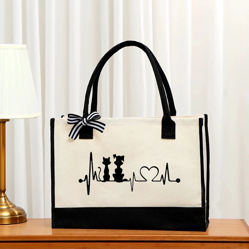 Line drawing cat shoulder bag women's large capacity cotton handbag fashion casual shopping bag commuting girl handbag book bag
Line drawing cat shoulder bag women's large capacity cotton handbag fashion casual shopping bag commuting girl handbag book bag