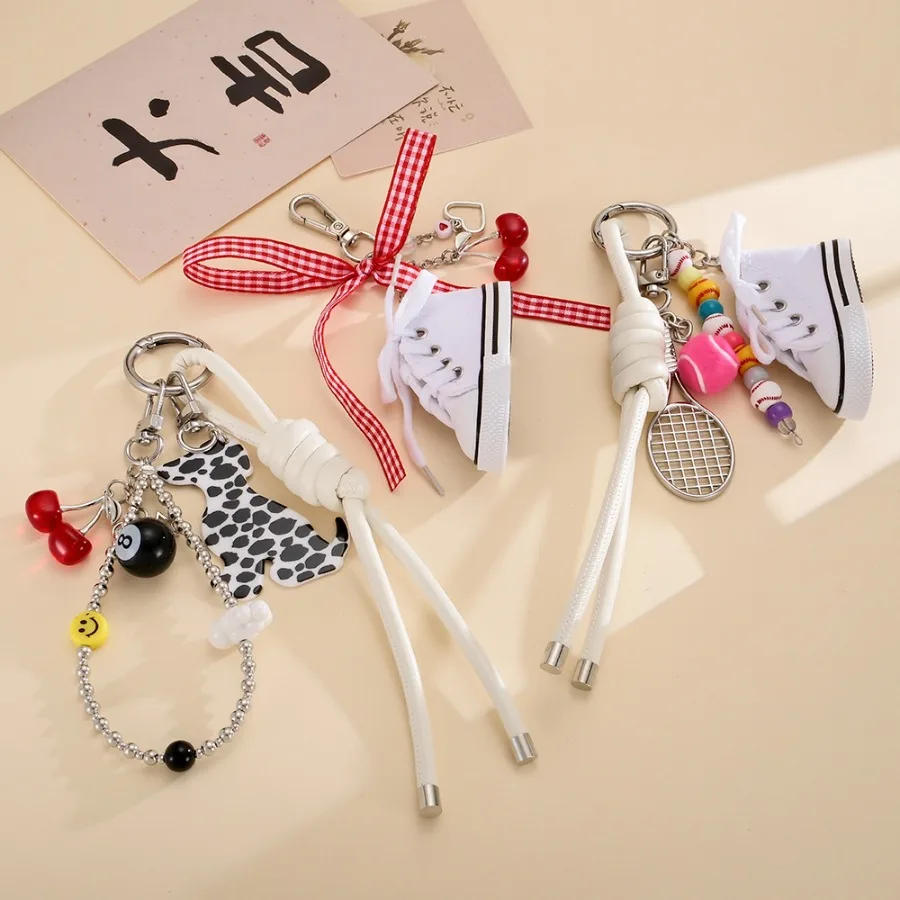 Small niche personality mini canvas shoes cherry key small pendant all-match sports style tennis beaded bag pendant female
Small niche personality mini canvas shoes cherry key small pendant all-match sports style tennis beaded bag pendant female