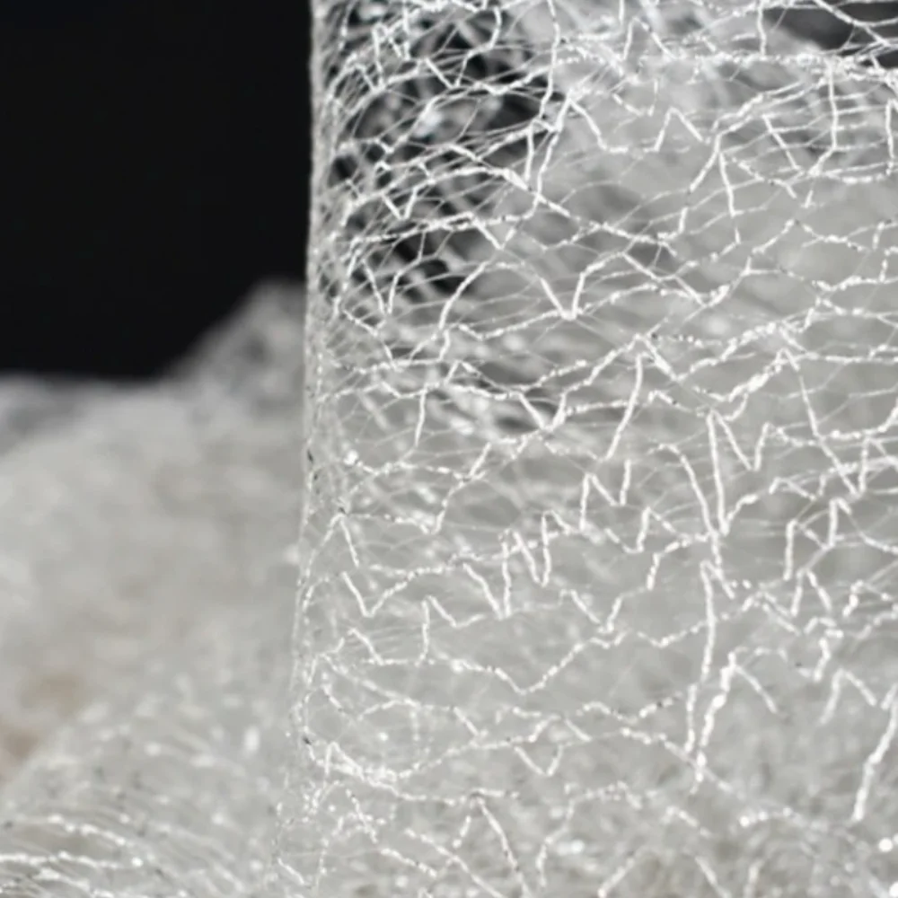 Silver Gray Hollowing Out Mesh Fabric for DIY Sewing Weave Creative Lace Wedding Decoration Designer Cloth Lightweight Fabrics
Silver Gray Hollowing Out Mesh Fabric for DIY Sewing Weave Creative Lace Wedding Decoration Designer Cloth Lightweight Fabrics
