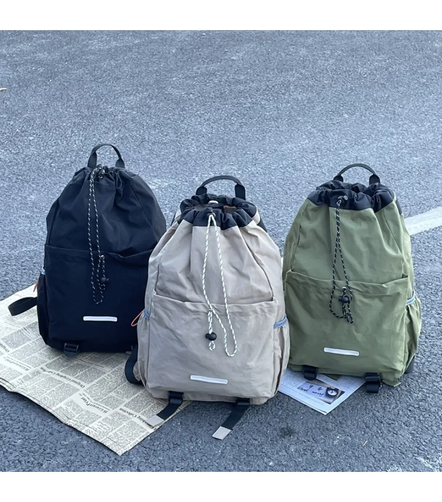 Drawstring retro backpack men's new nylon waterproof college student sports outdoor couple travel backpack tide
Drawstring retro backpack men's new nylon waterproof college student sports outdoor couple travel backpack tide