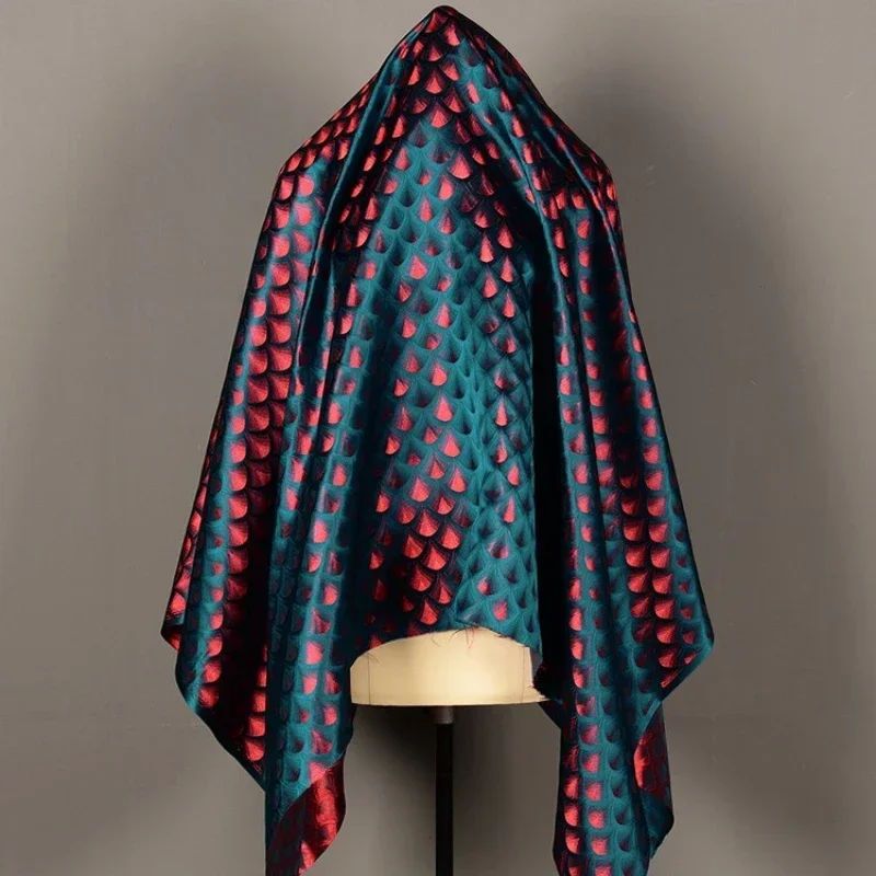 Peacock Green Woven Satin Fabric with Fan Shaped Wave Patterns Colorful Fish Scales Jacquard Satin Gradient Silk Fabric
Peacock Green Woven Satin Fabric with Fan Shaped Wave Patterns Colorful Fish Scales Jacquard Satin Gradient Silk Fabric