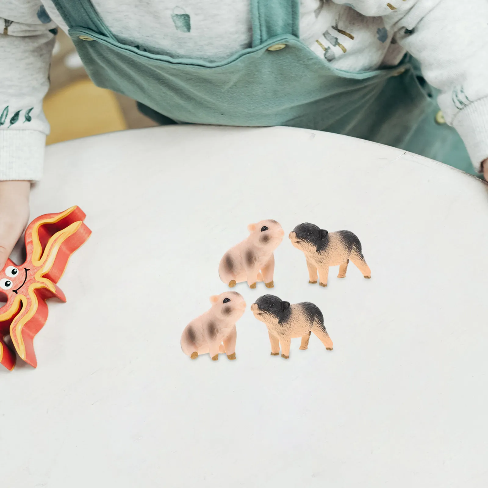 Набор из 6 реалистичных миниатюрных фигурок свиней, расписанных вручную, для обучения, декора сада, украшения стола, из смолы
Набор из 6 реалистичных миниатюрных фигурок свиней, расписанных вручную, для обучения, декора сада, украшения стола, из смолы