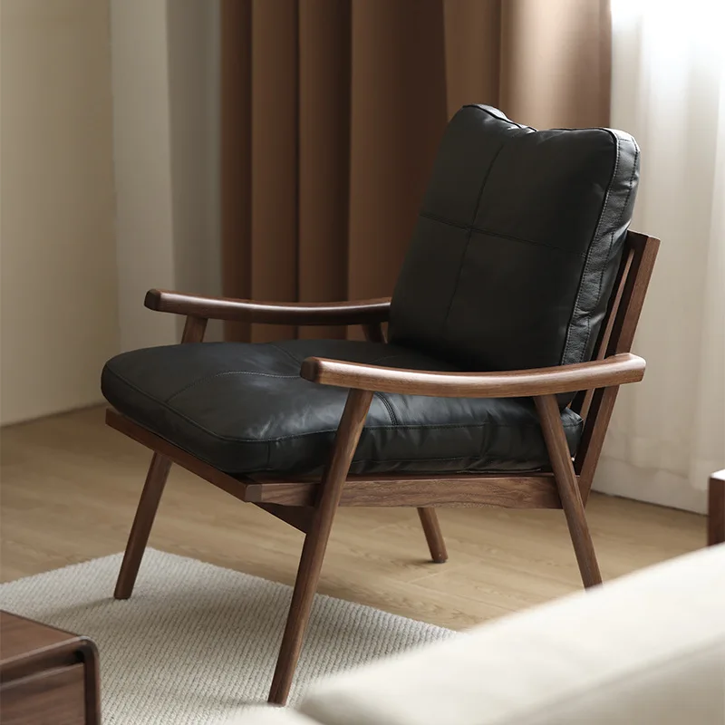 North American black walnut leisure chair Nordic single sofa chair table leather chair Italian light luxury designer furniture
North American black walnut leisure chair Nordic single sofa chair table leather chair Italian light luxury designer furniture