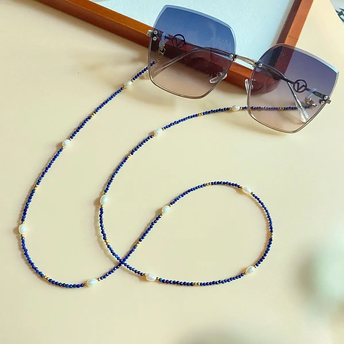 Natural Lapis Lazuli Eyeglasses Chain Pearl Necklace Earphone National Style New Chinese Sunglasses Accessories Niche Gift
Natural Lapis Lazuli Eyeglasses Chain Pearl Necklace Earphone National Style New Chinese Sunglasses Accessories Niche Gift