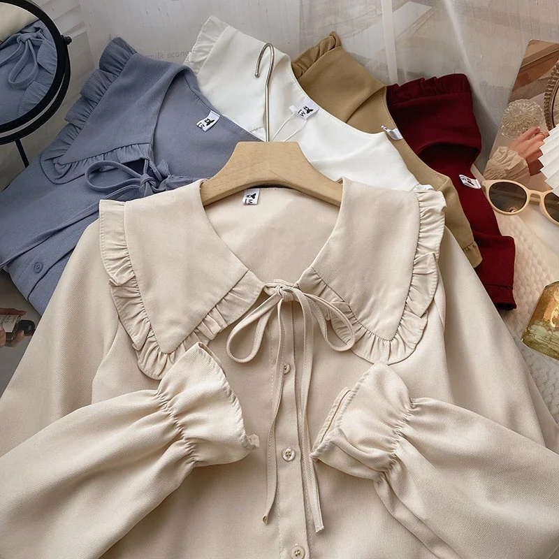 Sweet Doll Collar White Shirt Women's Korean Version Small Design Sense Bell Sleeve Top Polyester Fiber Long Sleeve Button Cl...
Sweet Doll Collar White Shirt Women's Korean Version Small Design Sense Bell Sleeve Top Polyester Fiber Long Sleeve Button Cl...