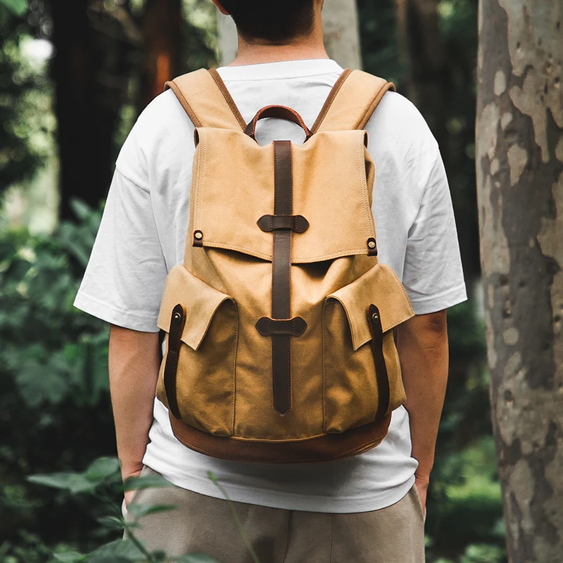 Outdoor wear-resistant canvas backpack, retro style backpack, travel computer bag, simple and large capacity schoolbag
Outdoor wear-resistant canvas backpack, retro style backpack, travel computer bag, simple and large capacity schoolbag