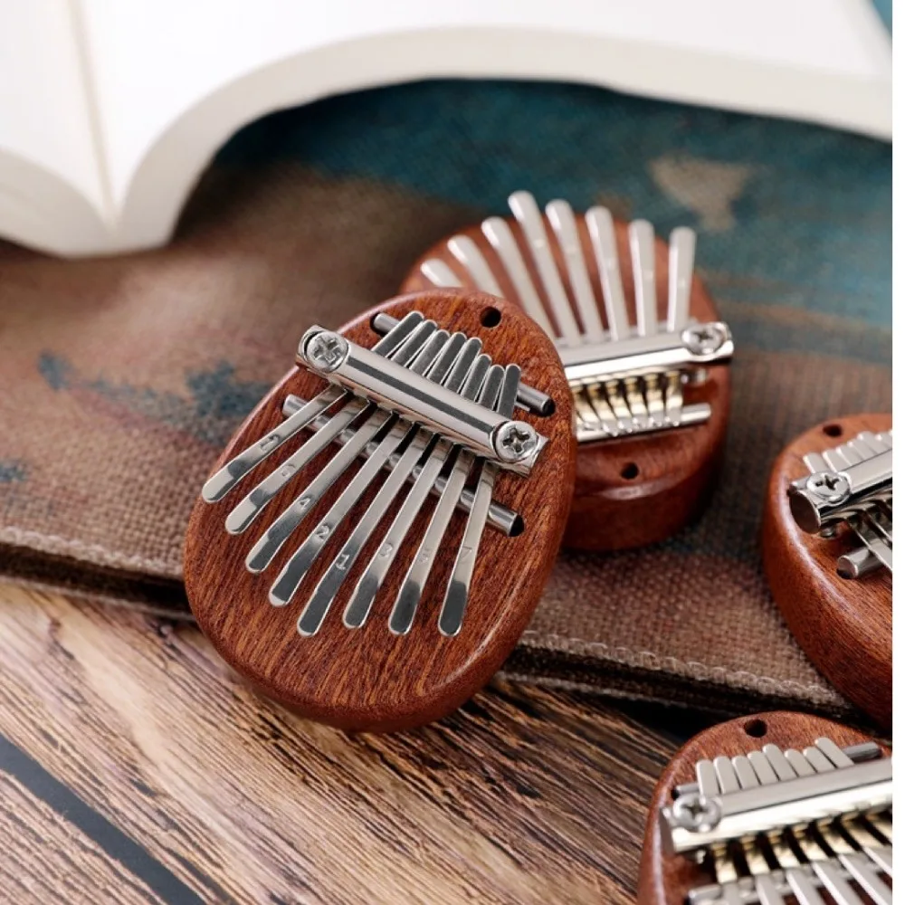 Keyboard Instrument Mini Finger Piano Marimba Exquisite 8 Keys Kalimba Gift with Pendant Hand Piano Kids Gift
Keyboard Instrument Mini Finger Piano Marimba Exquisite 8 Keys Kalimba Gift with Pendant Hand Piano Kids Gift