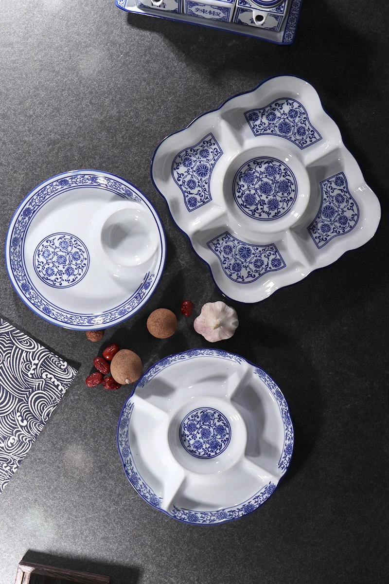 Under the glaze color ceramic fruit grid plate in the shape of irregular plate round square dried fruit sweet dumplings
Under the glaze color ceramic fruit grid plate in the shape of irregular plate round square dried fruit sweet dumplings