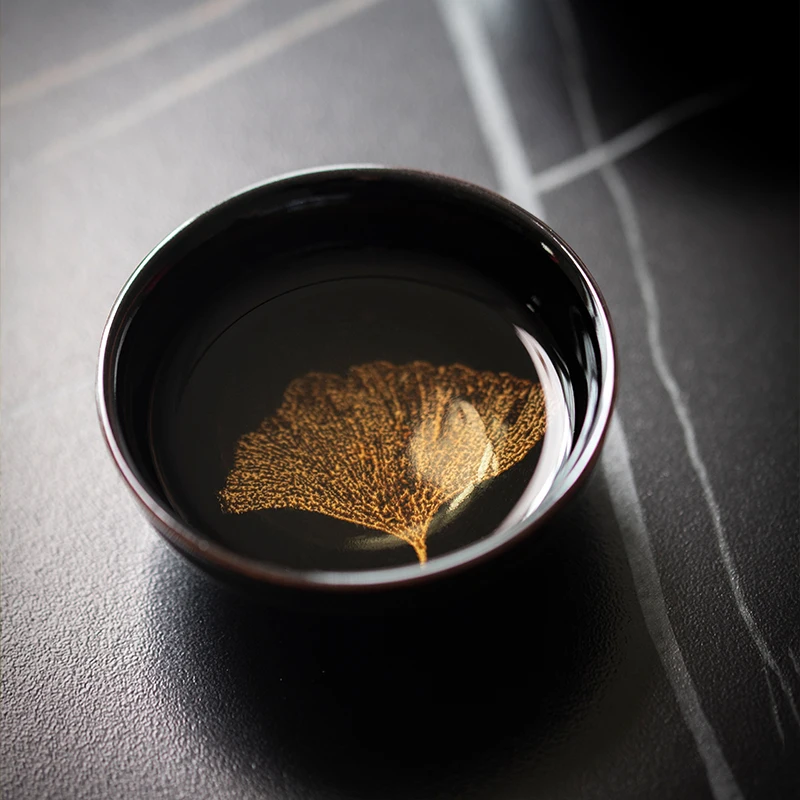 Wooden leaf Tianmu porcelain household tea set kungfu tea high-end creative tea set father's Day gift
Wooden leaf Tianmu porcelain household tea set kungfu tea high-end creative tea set father's Day gift