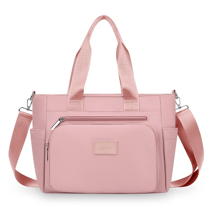 Trendy Oxford Canvas Shoulder Bag with Mom-Friendly Design Spacious Handbag for Women with Multiple Pockets and Stylish Look
Trendy Oxford Canvas Shoulder Bag with Mom-Friendly Design Spacious Handbag for Women with Multiple Pockets and Stylish Look
