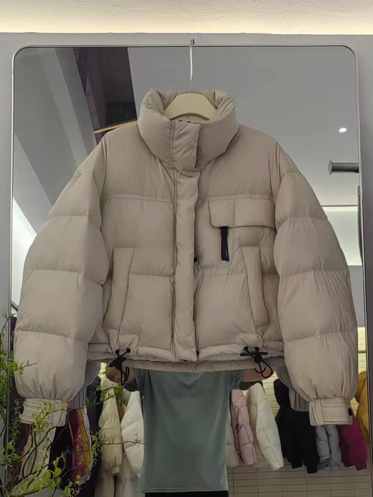2025 Winter New Down Jacket Women's Korean Edition Short Style Stand up Collar Thickened White Duck Down Leisure Warm Coat
2025 Winter New Down Jacket Women's Korean Edition Short Style Stand up Collar Thickened White Duck Down Leisure Warm Coat