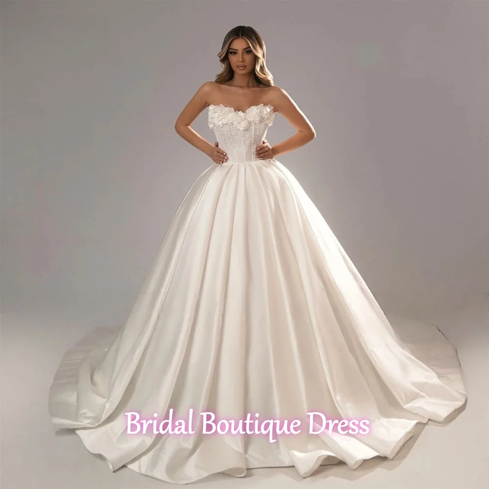 Customized Elegance Satin Princess A-Line Wedding Dresses Beaded Pearls 3D Flowers Sweetheart Bridal Gowns Ball Gown Train
Customized Elegance Satin Princess A-Line Wedding Dresses Beaded Pearls 3D Flowers Sweetheart Bridal Gowns Ball Gown Train
