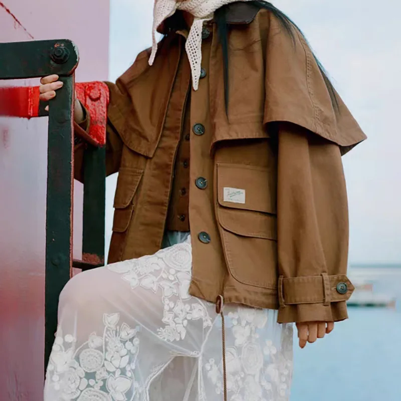 2025 New Autumn Winter Cloak Style Faux Leather Polo Collar Loose Hem Drawstring Trench Coat
2025 New Autumn Winter Cloak Style Faux Leather Polo Collar Loose Hem Drawstring Trench Coat