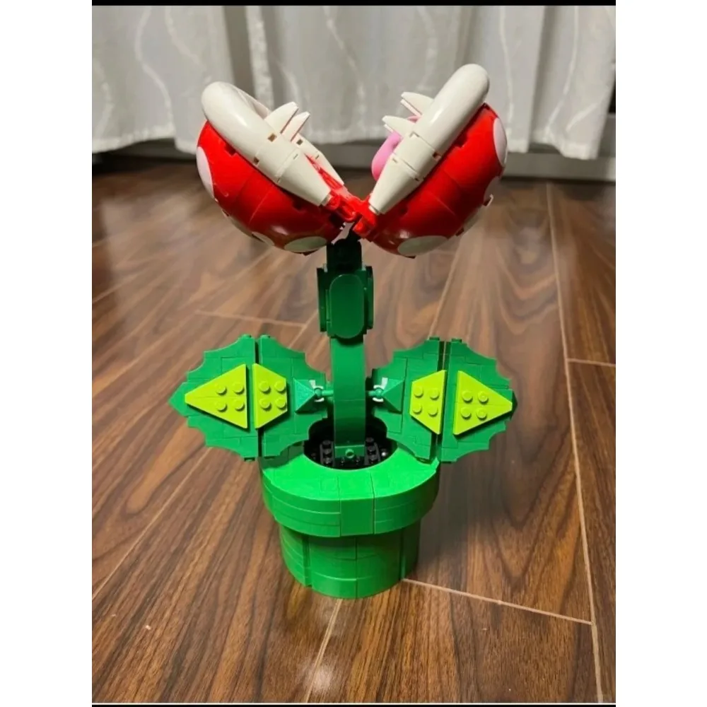 Наборы строительных блоков Cannibal Flower, совместимые с частицами Lego, подходят для рождественских подарков 71426
Наборы строительных блоков Cannibal Flower, совместимые с частицами Lego, подходят для рождественских подарков 71426