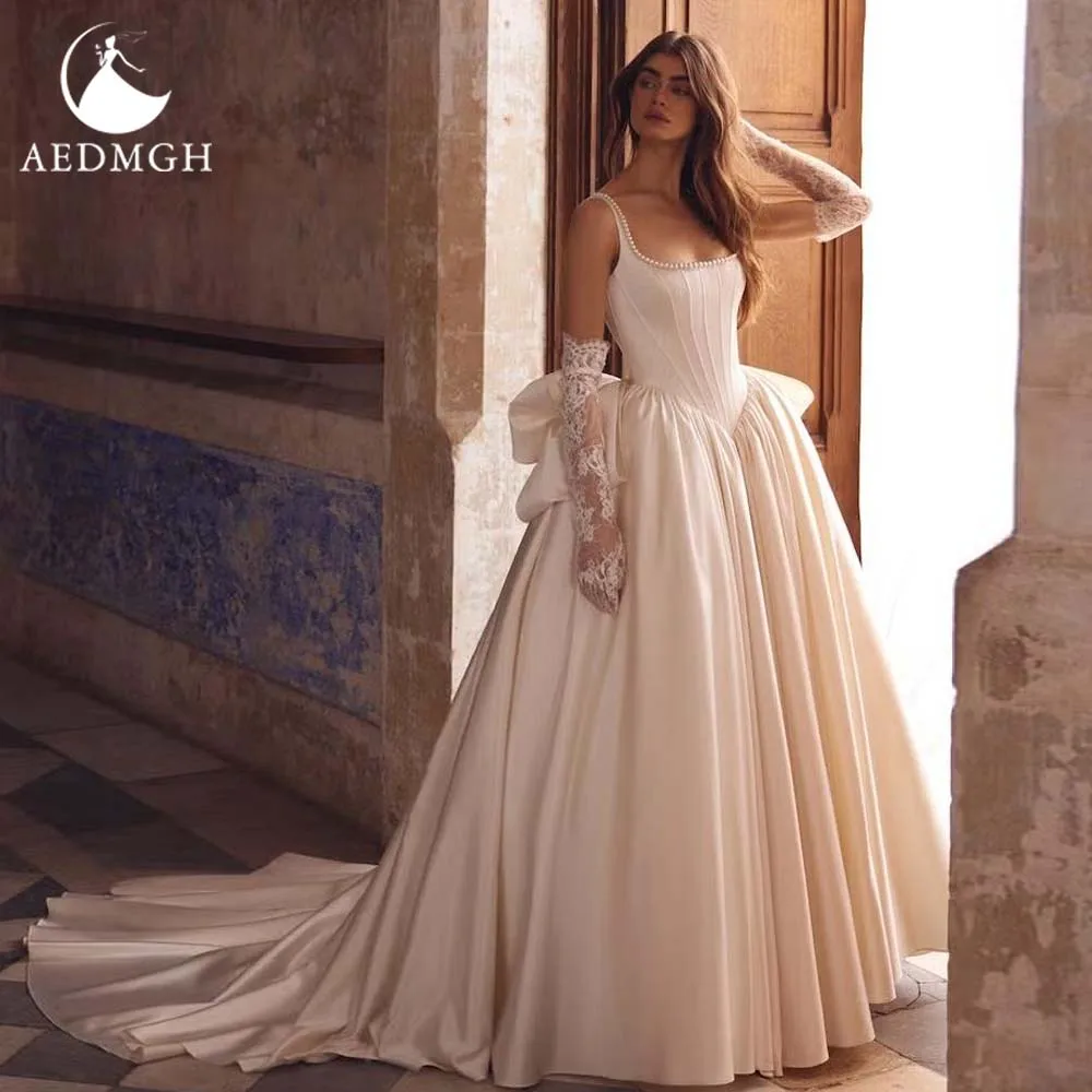 Aedmgh A-Line Elegant Wedding Dresses Boat Neck Sleeveless Vestido De Novia Lace Beaded Bow Matte Satin Custom Made Bridal Gown
Aedmgh A-Line Elegant Wedding Dresses Boat Neck Sleeveless Vestido De Novia Lace Beaded Bow Matte Satin Custom Made Bridal Gown