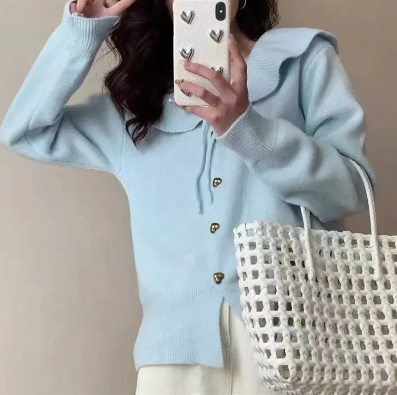 SKinny Winter Women's cardigan New ruffled doll collar Lace up knit sweater women Korean love single breasted long sleeve Coats
SKinny Winter Women's cardigan New ruffled doll collar Lace up knit sweater women Korean love single breasted long sleeve Coats