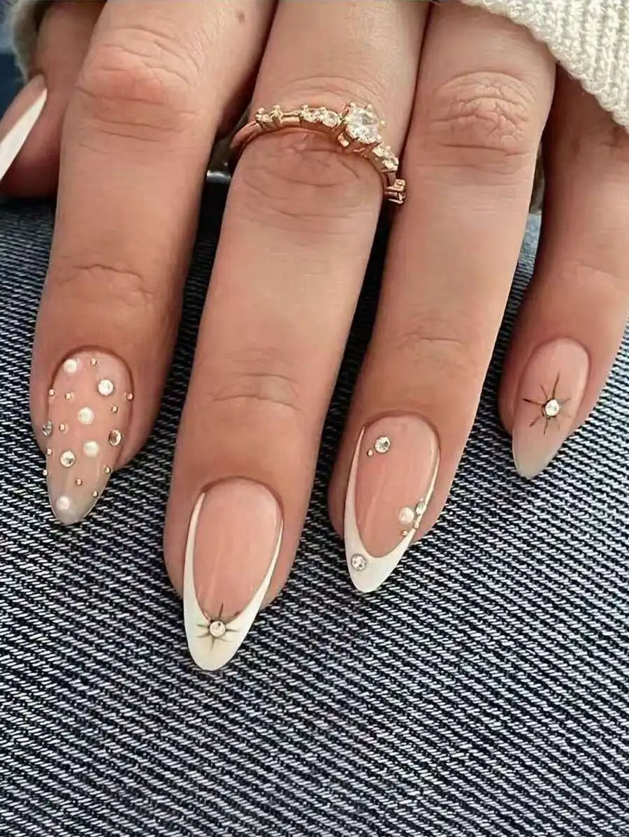 10 Handmade Almond-Shaped Press-On Nails: White French Tips With Starburst, Pearl, Steel Bead & Full Diamond Embellishments – Of
10 Handmade Almond-Shaped Press-On Nails: White French Tips With Starburst, Pearl, Steel Bead & Full Diamond Embellishments – Of