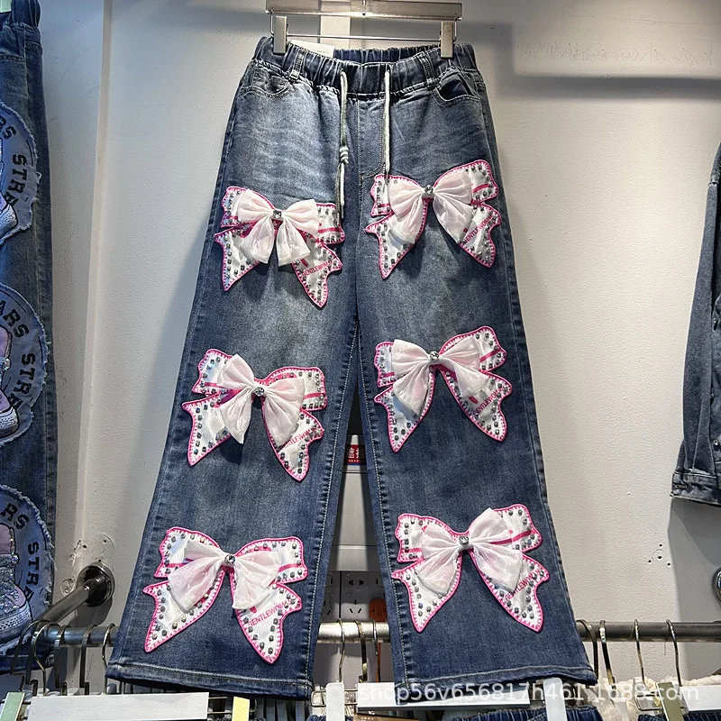 Модные женские джинсовые брюки с объемным бантом и бриллиантами, универсальные широкие джинсы с эластичной резинкой на талии, широкие повседневные прямые брюки
Модные женские джинсовые брюки с объемным бантом и бриллиантами, универсальные широкие джинсы с эластичной резинкой на талии, широкие повседневные прямые брюки