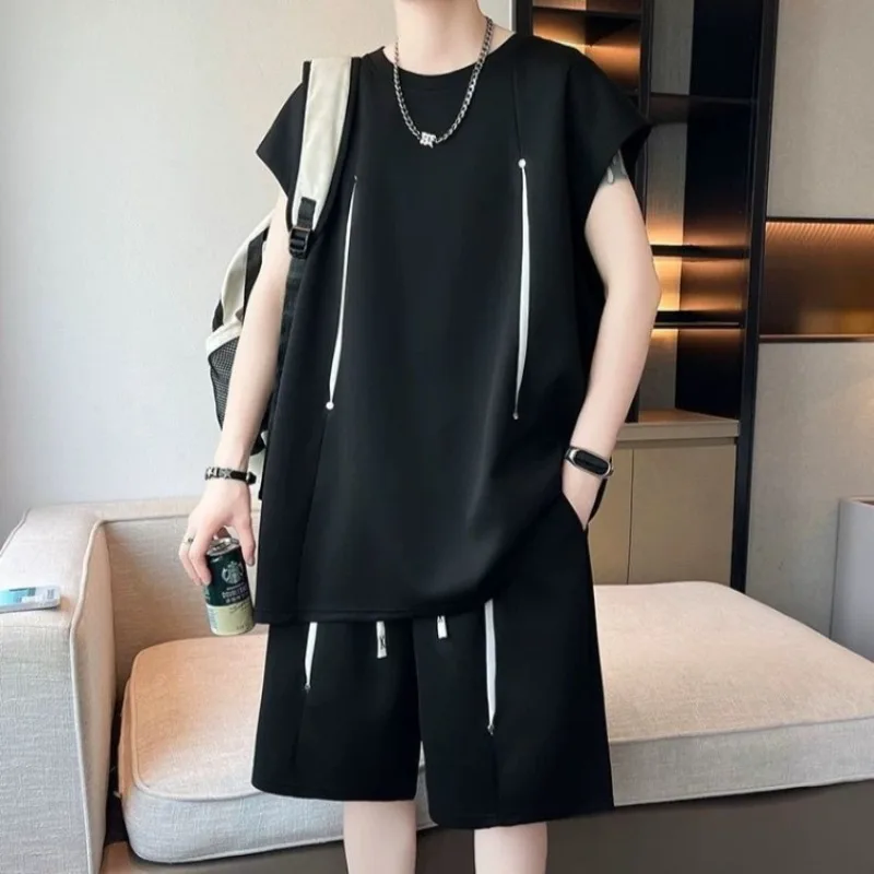 Summer Lightweight Breathable Men's Sleeveless T Shirt Shorts Set Teenage Casual Loose Sportswear 2 Piece Outfit for Students
Summer Lightweight Breathable Men's Sleeveless T Shirt Shorts Set Teenage Casual Loose Sportswear 2 Piece Outfit for Students